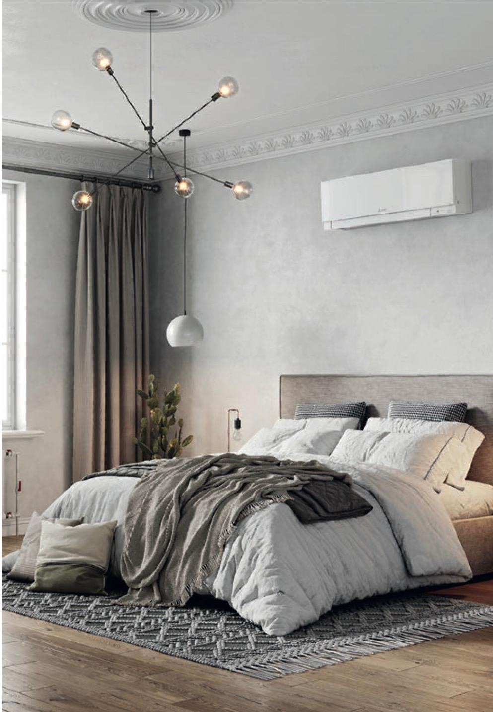 Wall-mounted air conditioning unit in a bedroom